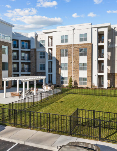 Luxury apartment building exterior with beautiful landscaping